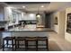 Spacious kitchen with stainless steel appliances, granite countertops, and breakfast bar at 104 Legend Oaks Way, Summerville, SC 29485