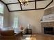 Comfortable living room featuring vaulted ceilings, fireplace, and plenty of natural light at 104 Legend Oaks Way, Summerville, SC 29485