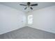 Bedroom features a large double door closet, ceiling fan and window at 104 Mayfield Dr, Goose Creek, SC 29445