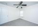 Clean bedroom featuring plush carpet, a ceiling fan, and window at 104 Mayfield Dr, Goose Creek, SC 29445