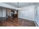 Dining area with hardwood floors, a modern chandelier, and lots of natural light at 104 Mayfield Dr, Goose Creek, SC 29445