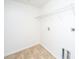 Functional laundry room featuring tile flooring and wire shelving at 104 Mayfield Dr, Goose Creek, SC 29445