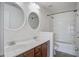 Bathroom with double sink vanity, mirrors, and shower-tub combo at 109 Charlesfort Way, Moncks Corner, SC 29461