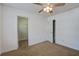 This bedroom features a ceiling fan, closet, and a neutral color palette at 109 Charlesfort Way, Moncks Corner, SC 29461