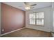 Cozy bedroom with a ceiling fan and natural light from the window at 109 Charlesfort Way, Moncks Corner, SC 29461