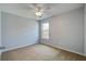 Neutral bedroom with a ceiling fan and a window bringing in natural light at 109 Charlesfort Way, Moncks Corner, SC 29461