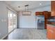 Bright dining area with access to backyard and modern light fixture at 109 Charlesfort Way, Moncks Corner, SC 29461
