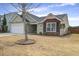 Attractive one-story home featuring a brick accent and a neatly landscaped front yard at 109 Charlesfort Way, Moncks Corner, SC 29461