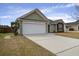 Charming single-Gathering home with a two-car garage and a well-maintained lawn at 109 Charlesfort Way, Moncks Corner, SC 29461