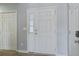 Bright foyer featuring tile flooring and neutral paint at 109 Charlesfort Way, Moncks Corner, SC 29461
