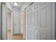 Hallway with white doors and neutral carpeting at 109 Charlesfort Way, Moncks Corner, SC 29461