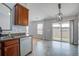 Open kitchen overlooks a patio with sliding glass doors and backyard at 109 Charlesfort Way, Moncks Corner, SC 29461