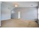Spacious living room with vaulted ceilings and neutral carpeting at 109 Charlesfort Way, Moncks Corner, SC 29461