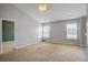 Spacious living room featuring neutral walls, carpet, and great natural light at 109 Charlesfort Way, Moncks Corner, SC 29461