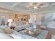 Living room with a view of the kitchen, stylish furniture, and open floor plan at 110 Crosscut Ln, Summerville, SC 29486