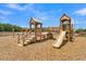 Wooden playground featuring a slide, swings, and climbing structures for outdoor fun at 110 Crosscut Ln, Summerville, SC 29486