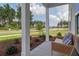 Inviting front porch featuring a cozy bench and beautiful landscaping at 110 Crosscut Ln, Summerville, SC 29486