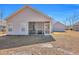 Well-maintained backyard featuring a screened-in porch and additional outdoor space at 111 Pacolet St, Summerville, SC 29485