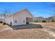 Well-maintained backyard featuring a screened-in porch and additional outdoor space at 111 Pacolet St, Summerville, SC 29485