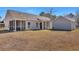 Well-maintained backyard featuring a screened-in porch and additional outdoor space at 111 Pacolet St, Summerville, SC 29485