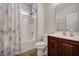 Bathroom featuring a shower/bathtub combo and wood vanity with sink at 111 Pacolet St, Summerville, SC 29485