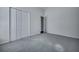 Neutral carpeted bedroom features a large closet with folding doors at 111 Pacolet St, Summerville, SC 29485