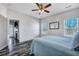 This charming bedroom features wood-look floors and two large windows at 111 Pacolet St, Summerville, SC 29485