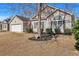 Charming single-story home with a detached garage and well-maintained landscaping in a peaceful neighborhood at 111 Pacolet St, Summerville, SC 29485