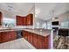 Open layout showcasing the kitchen leading into the living room with fireplace at 111 Pacolet St, Summerville, SC 29485