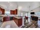 Open layout showcasing the kitchen leading into the living room with fireplace at 111 Pacolet St, Summerville, SC 29485