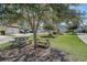 Well-maintained community green space with picnic tables and mature shade trees at 1118 John Mcenery Rd, Charleston, SC 29412