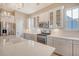Elegant kitchen featuring white and grey cabinetry, stainless steel appliances, and a bright, inviting atmosphere at 1118 John Mcenery Rd, Charleston, SC 29412
