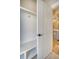 Mudroom includes seating area with hooks and storage cubbies with view into kitchen at 1118 John Mcenery Rd, Charleston, SC 29412