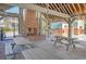 Outdoor pavilion featuring a cozy brick fireplace and picnic tables, ideal for gatherings at 1118 John Mcenery Rd, Charleston, SC 29412