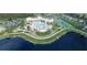 Aerial view of the community's resort-style pool, tennis courts, clubhouse, and well-manicured walking paths at 1140 Darling St, Summerville, SC 29485
