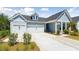 Charming single-Gathering home featuring a well-manicured lawn, a two car garage and welcoming curb appeal at 1140 Darling St, Summerville, SC 29485