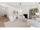 Bright living room with a fireplace, and an open concept design, creating a cozy and inviting space at 1140 Darling St, Summerville, SC 29485