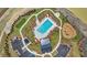 Aerial view of community pool, playground, putting green, clubhouse, parking areas at 121 Grange Cir, Summerville, SC 29486