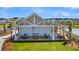 Relax in style in the covered poolside pavilion with ample tables and seating at 121 Grange Cir, Summerville, SC 29486
