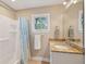 Traditional bathroom with a granite countertop, a shower/tub combination and neutral walls at 1217 Bamboo Dr, Charleston, SC 29407