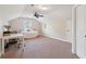 Spacious bedroom with large windows, plush carpet and a ceiling fan at 1217 Bamboo Dr, Charleston, SC 29407