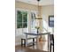 Cozy dining area with hardwood floors, natural light, and a view of the outdoor scenery at 1217 Bamboo Dr, Charleston, SC 29407