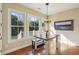 Dining area with natural light boasts beautiful windows and wood floors at 1217 Bamboo Dr, Charleston, SC 29407