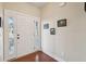 Bright entryway with beautiful hardwood floors and decorative wall art, perfect for guests at 1217 Bamboo Dr, Charleston, SC 29407