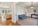 Foyer shows entryway, hardwood floors, leading into a living space and view of the screened porch at 1217 Bamboo Dr, Charleston, SC 29407