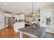 Open-concept: view of kitchen with granite counters and stainless appliances, flowing to dining and living area at 1217 Bamboo Dr, Charleston, SC 29407