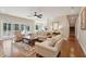 Spacious living room with hardwood floors, neutral tones, and access to outdoor deck at 1217 Bamboo Dr, Charleston, SC 29407