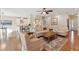 Bright living room with hardwood floors and access to the kitchen with bar seating at 1217 Bamboo Dr, Charleston, SC 29407