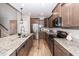 Kitchen featuring stainless steel appliances, gray cabinets, granite countertops, and hardwood floors at 123 Lakelyn Rd, Moncks Corner, SC 29461