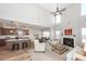 A living room with a fireplace, a large window, and hardwood floors at 123 Lakelyn Rd, Moncks Corner, SC 29461